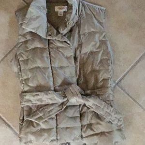 Neutral, puffy vest.